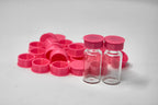 Pink reusable TPU vial caps with vials