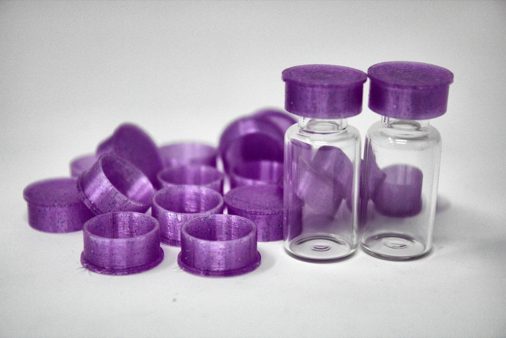 Purple reusable TPU vial caps with vials